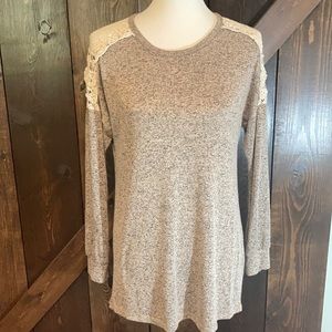 Boutique top with crochet lace cutout